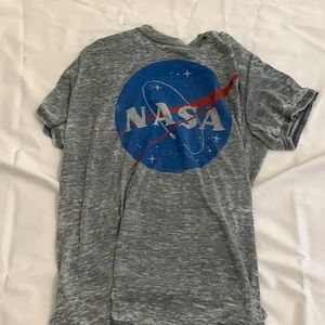 a distressed thin nasa shirt